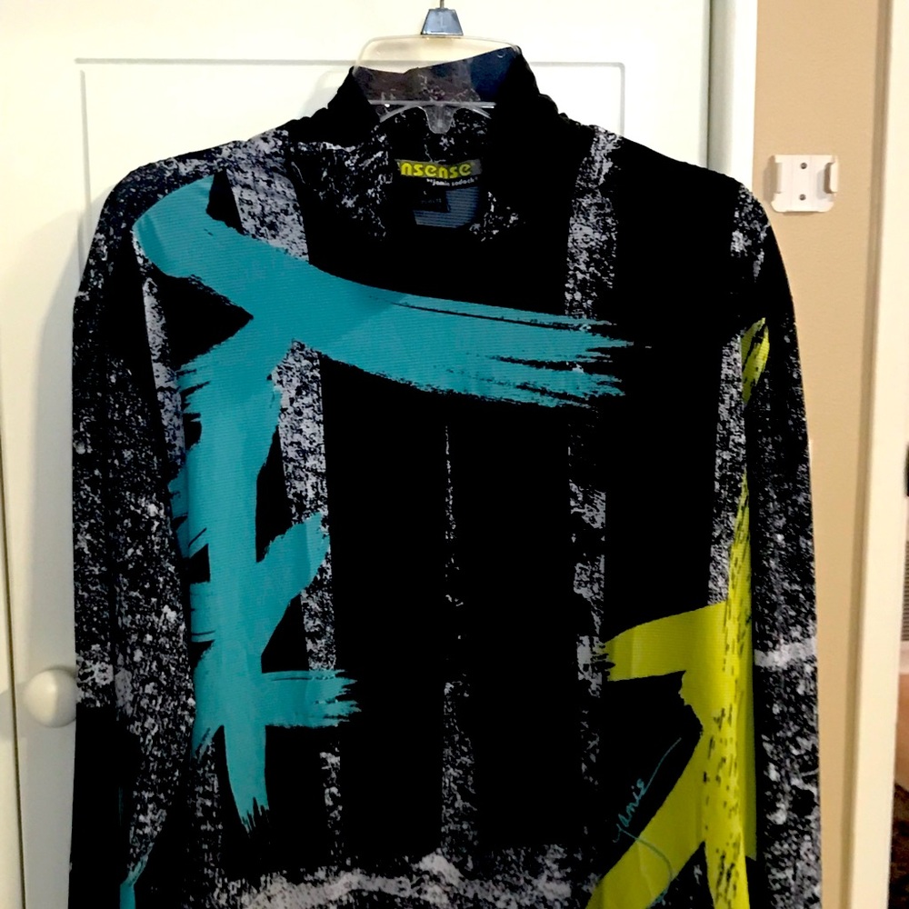 Jamie Sadock long sleeve, cowl neck golf top.